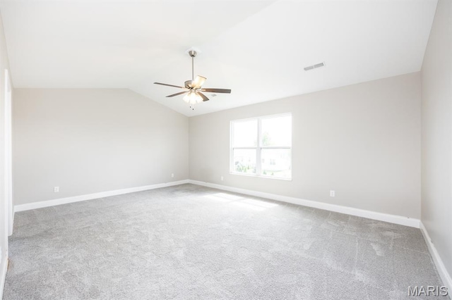 135 Reagan Dr, Troy, IL 62294 - unfurnished room featuring ceiling fan, vaulted ceiling, carpet floors, and baseboards