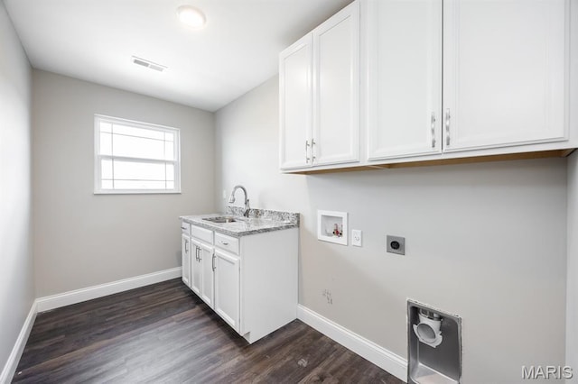 135 Reagan Dr, Troy, IL 62294 - washroom with electric dryer hookup, hookup for a washing machine, dark wood-type flooring, and baseboards