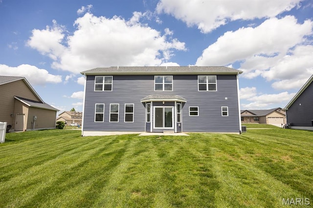 135 Reagan Dr, Troy, IL 62294 - back of house featuring a yard