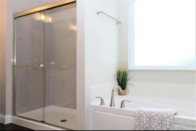135 Reagan Dr, Troy, IL 62294 - full bath with a bath and a shower stall