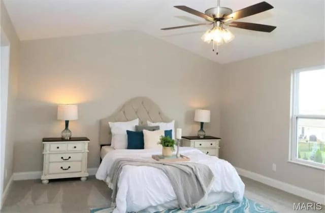 135 Reagan Dr, Troy, IL 62294 - bedroom featuring baseboards, lofted ceiling, ceiling fan, and light carpet