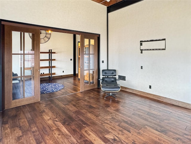 6 E Front St Unit 6, Washington, MO 63090 - unfurnished room with a towering ceiling, wood finished floors, and french doors