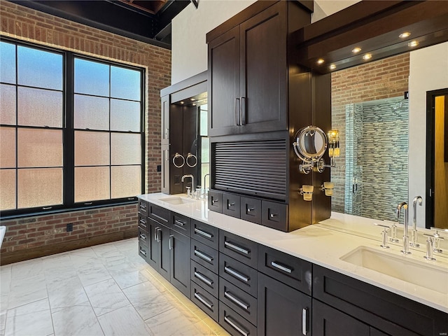 6 E Front St Unit 6, Washington, MO 63090 - full bath with brick wall, double vanity, marble finish flooring, and a tile shower