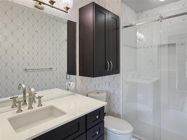 6 E Front St Unit 6, Washington, MO 63090 - bathroom with wallpapered walls, a stall shower, toilet, and vanity