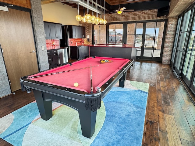 6 E Front St Unit 6, Washington, MO 63090 - recreation room featuring dark wood-style flooring, billiards, brick wall, healthy amount of natural light, and beam ceiling