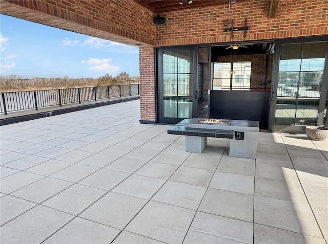 6 E Front St Unit 6, Washington, MO 63090 - view of patio / terrace featuring an outdoor fire pit and fence