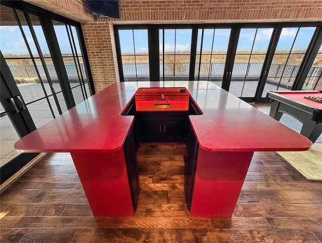 6 E Front St Unit 6, Washington, MO 63090 - interior space with a water view, brick wall, and wood finished floors