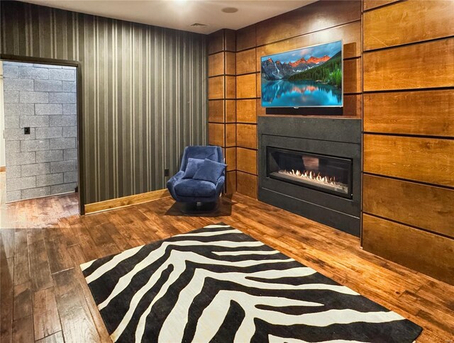 6 E Front St Unit 6, Washington, MO 63090 - unfurnished room with wood finished floors, a glass covered fireplace, and baseboards
