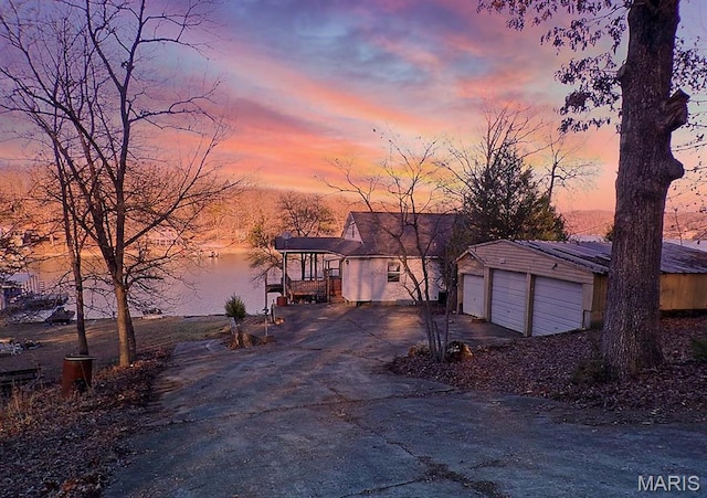 1153 Red Fox Rd, Camdenton, MO 65324 - view of front of property with a garage and an outbuilding