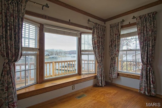 1153 Red Fox Rd, Camdenton, MO 65324 - detailed view of a water view, ornamental molding, and baseboards
