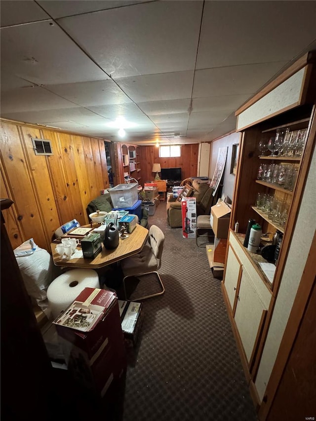 9594 Muriel Ave, Saint Louis, MO 63114 - miscellaneous room with carpet, wood walls, and a paneled ceiling