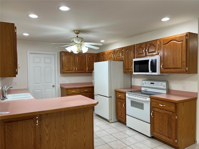 9606 Drawbridge Ln, Hillsboro, MO 63050 - kitchen featuring white appliances, a sink, a ceiling fan, light tile patterned flooring, and light countertops