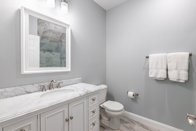 24345 State Rte Ww Unit 46, Saint Genevieve, MO 63670 - full bathroom featuring a tile shower, toilet, vanity, and baseboards
