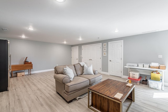 24345 State Rte Ww Unit 46, Saint Genevieve, MO 63670 - living room featuring light wood-type flooring, baseboards, and recessed lighting
