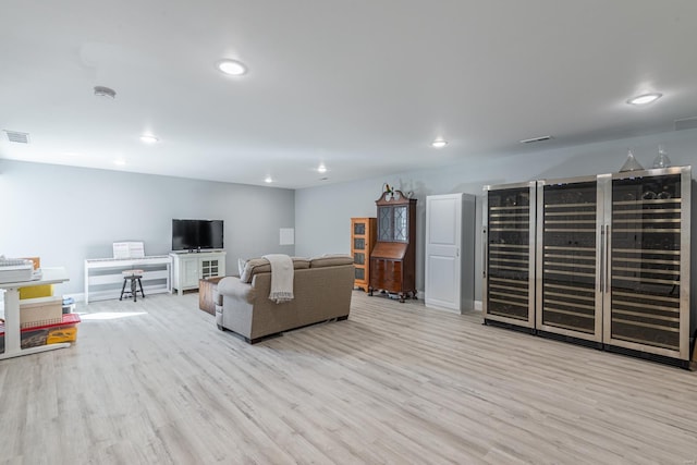 24345 State Rte Ww Unit 46, Saint Genevieve, MO 63670 - living room with wood finished floors, recessed lighting, baseboards, and beverage cooler