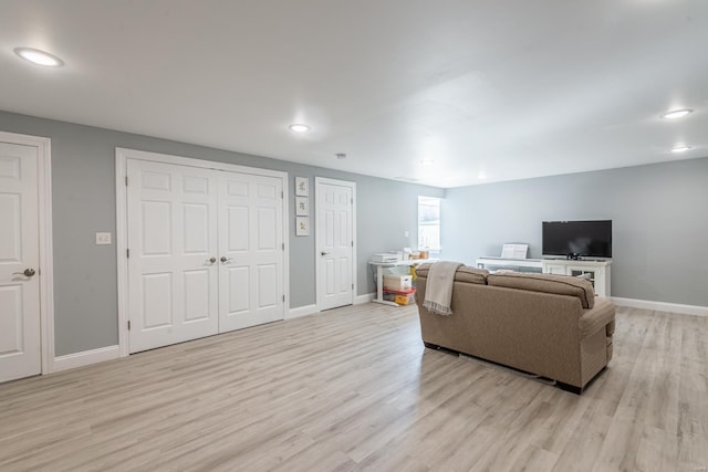 24345 State Rte Ww Unit 46, Saint Genevieve, MO 63670 - living room with light wood-type flooring, baseboards, and recessed lighting