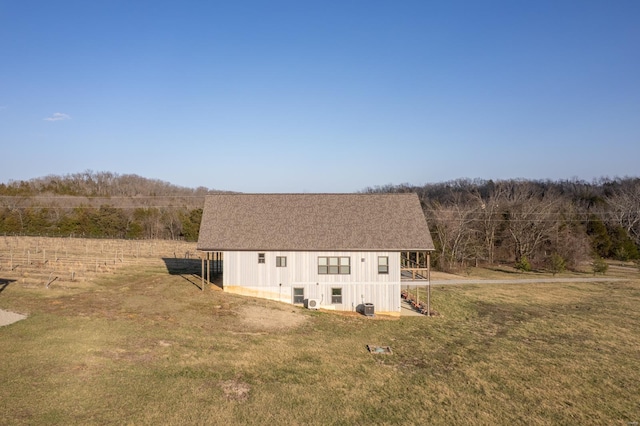 24345 State Rte Ww Unit 46, Saint Genevieve, MO 63670 - view of side of property featuring a yard and central AC unit