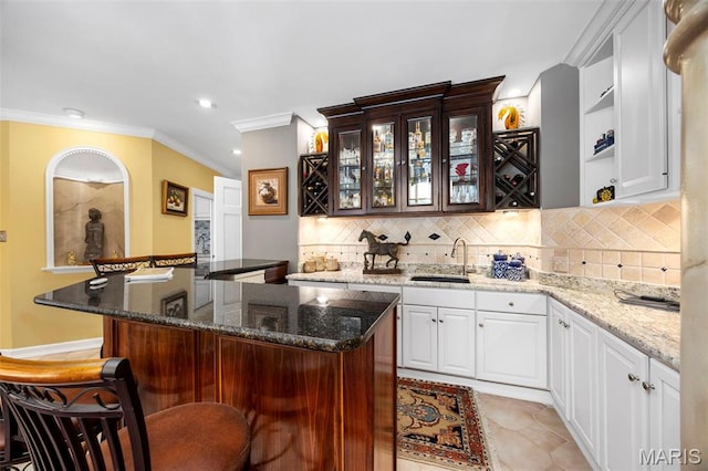 651 Kiefer Creek Rd, Ballwin, MO 63021 - indoor wet bar featuring crown molding, backsplash, and recessed lighting