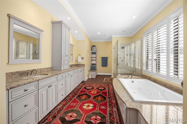651 Kiefer Creek Rd, Ballwin, MO 63021 - full bath featuring a shower stall, crown molding, a tub with jets, recessed lighting, and double vanity