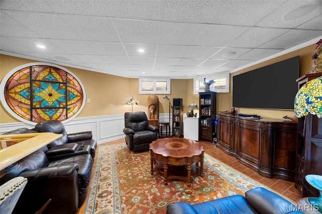 651 Kiefer Creek Rd, Ballwin, MO 63021 - living room featuring a drop ceiling, recessed lighting, and a wainscoted wall
