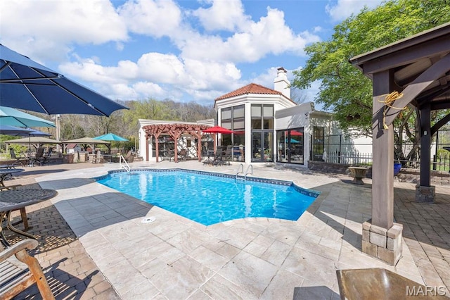 651 Kiefer Creek Rd, Ballwin, MO 63021 - swimming pool featuring a patio area, fence, and a pergola