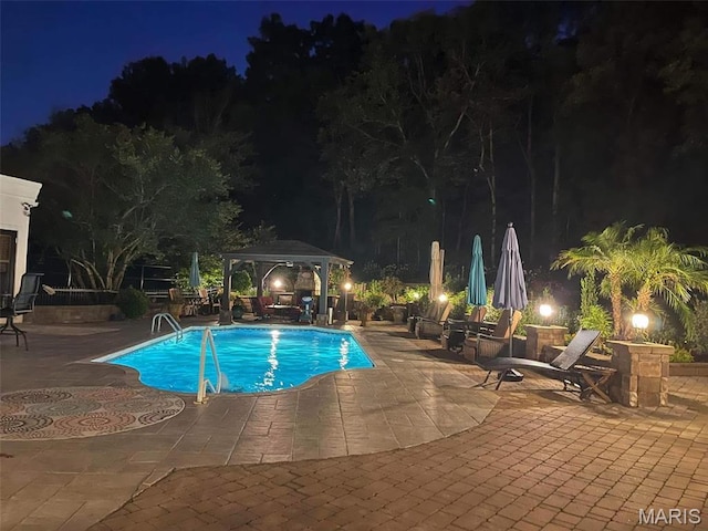 651 Kiefer Creek Rd, Ballwin, MO 63021 - pool at twilight with a gazebo and a patio
