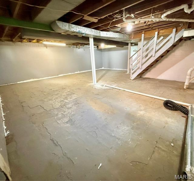 19 S Schlueter Ave, Saint Louis, MO 63135 - unfinished basement featuring stairs