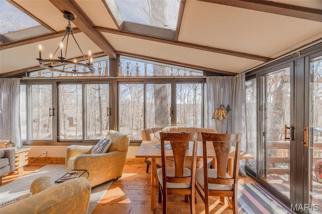 566 Aspen View Dr, Innsbrook, MO 63390 - sunroom with hardwood / wood-style floors and a chandelier