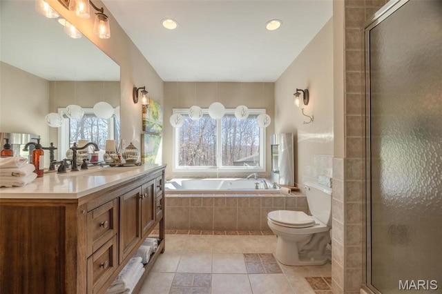 566 Aspen View Dr, Innsbrook, MO 63390 - full bathroom featuring a bath, vanity, tile patterned flooring, a tile shower, and toilet