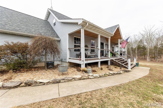 11720 County Road 5160, Rolla, MO 65401 - view of front facade with covered porch and roof with shingles