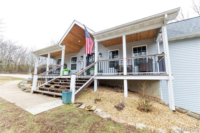 11720 County Road 5160, Rolla, MO 65401 - rear view of property with covered porch and roof with shingles
