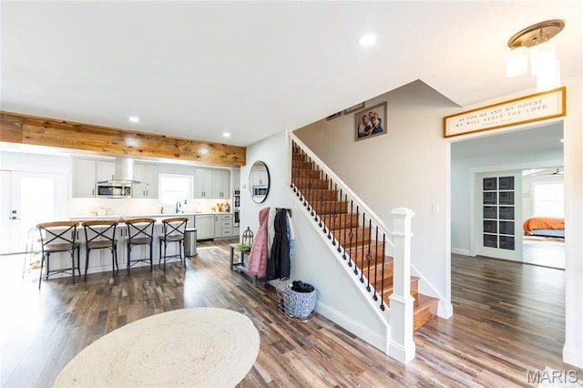 11720 County Road 5160, Rolla, MO 65401 - living area featuring dark wood finished floors, recessed lighting, stairway, plenty of natural light, and baseboards