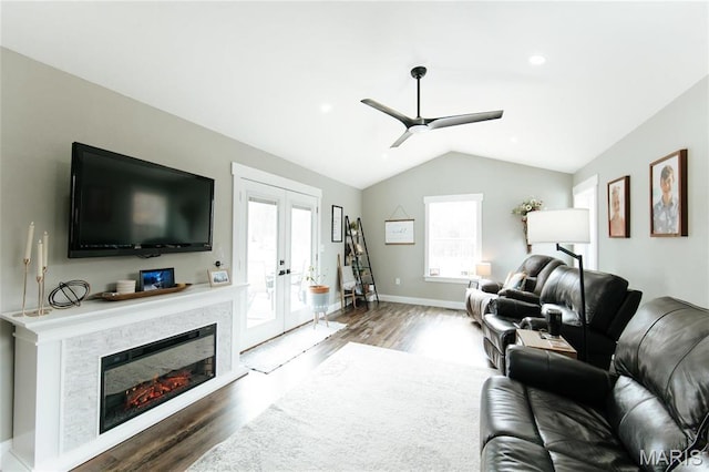 11720 County Road 5160, Rolla, MO 65401 - living area with wood finished floors, french doors, lofted ceiling, healthy amount of natural light, and ceiling fan