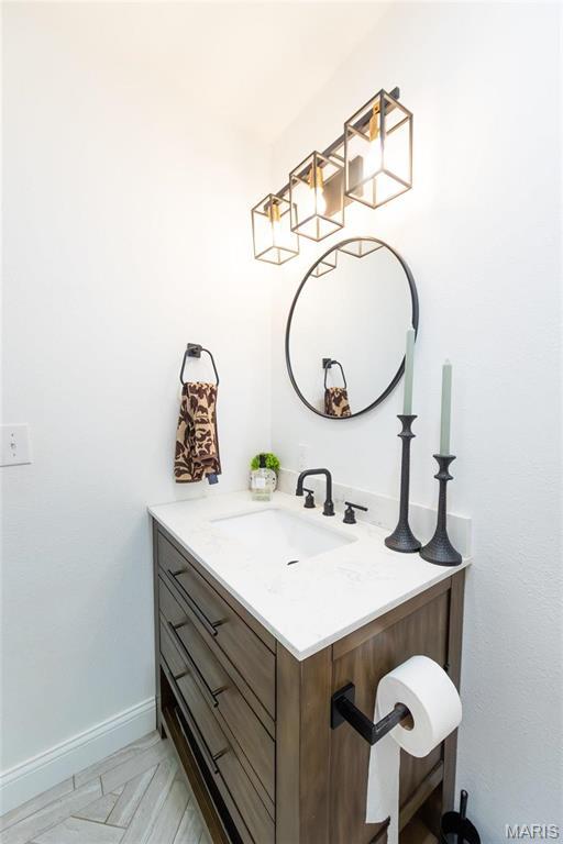 11720 County Road 5160, Rolla, MO 65401 - bathroom with vanity and baseboards
