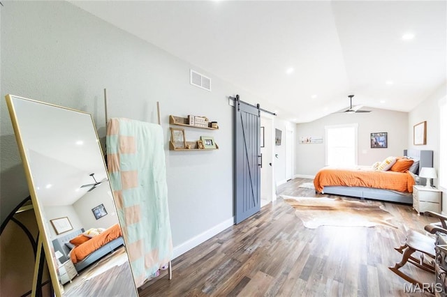 11720 County Road 5160, Rolla, MO 65401 - bedroom featuring a barn door, vaulted ceiling, wood finished floors, baseboards, and ceiling fan