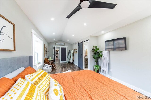 11720 County Road 5160, Rolla, MO 65401 - bedroom with a barn door, wood finished floors, lofted ceiling, baseboards, and recessed lighting