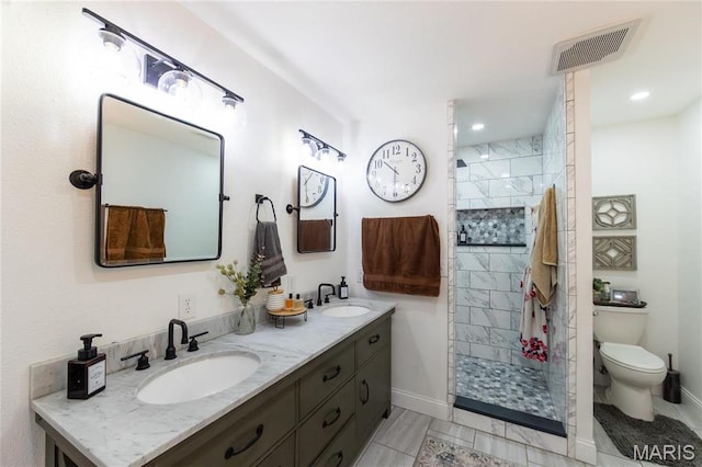 11720 County Road 5160, Rolla, MO 65401 - full bath with toilet, tiled shower, double vanity, baseboards, and recessed lighting
