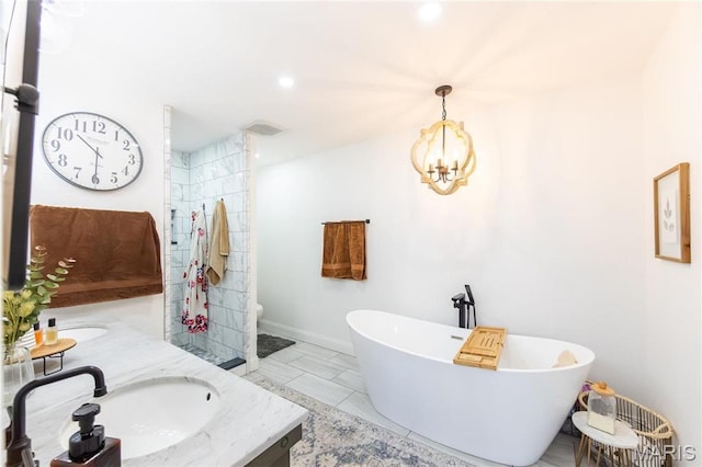 11720 County Road 5160, Rolla, MO 65401 - full bath featuring double vanity, a chandelier, a soaking tub, tiled shower, and marble finish flooring