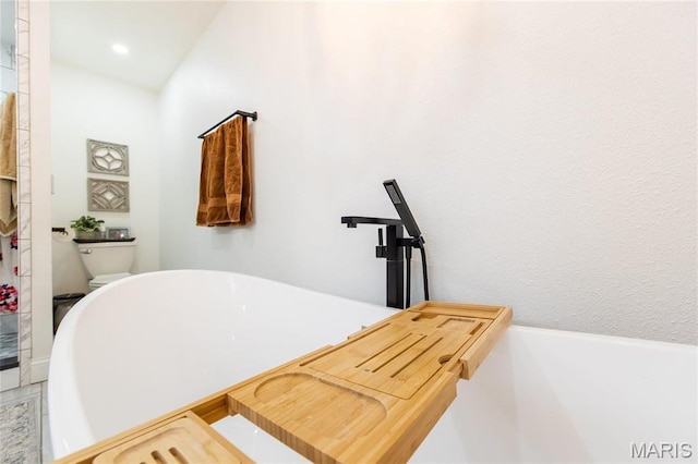 11720 County Road 5160, Rolla, MO 65401 - full bath with a freestanding tub, toilet, and recessed lighting