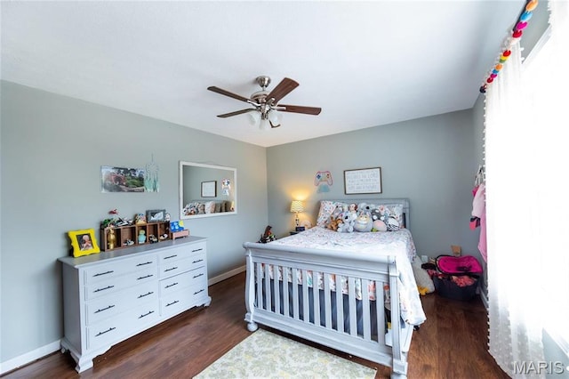 11720 County Road 5160, Rolla, MO 65401 - bedroom featuring wood finished floors, baseboards, and a ceiling fan
