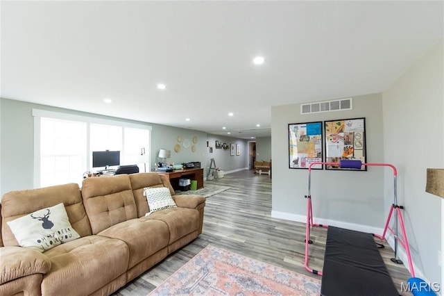11720 County Road 5160, Rolla, MO 65401 - living room featuring an office area, baseboards, recessed lighting, and wood finished floors