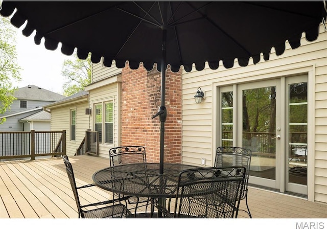 668 Clear Brook Dr, Des Peres, MO 63122 - wooden deck featuring outdoor dining area
