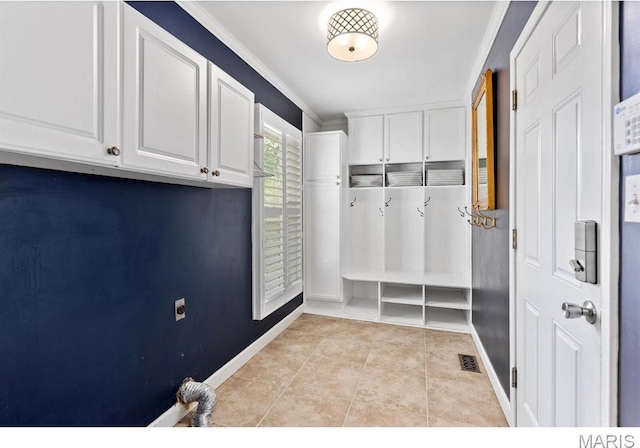 668 Clear Brook Dr, Des Peres, MO 63122 - mudroom with ornamental molding, baseboards, and light tile patterned floors