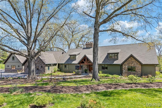 5 Glaizeview Rd, Town And Country, MO 63017 - view of front of property with a chimney and roof with shingles