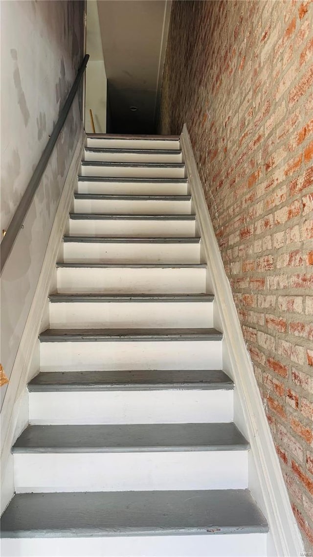 3683 Montana St, Saint Louis, MO 63116 - staircase with brick wall
