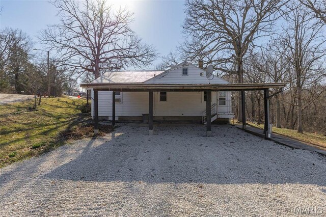 699 Clement Rd, Bloomsdale, MO 63627 - view of front of property with a carport, a chimney, and driveway