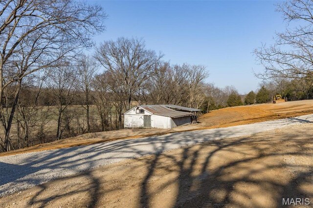 699 Clement Rd, Bloomsdale, MO 63627 - view of yard featuring an outdoor structure