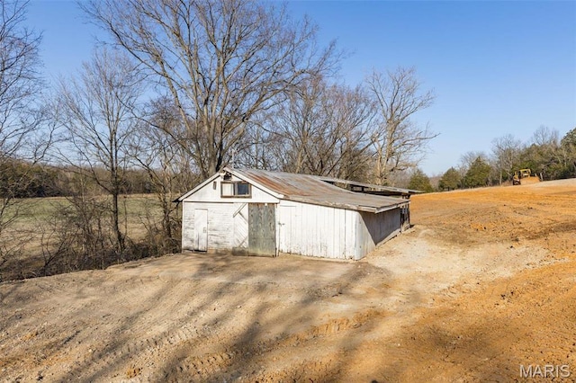 699 Clement Rd, Bloomsdale, MO 63627 - view of outdoor structure with an outbuilding
