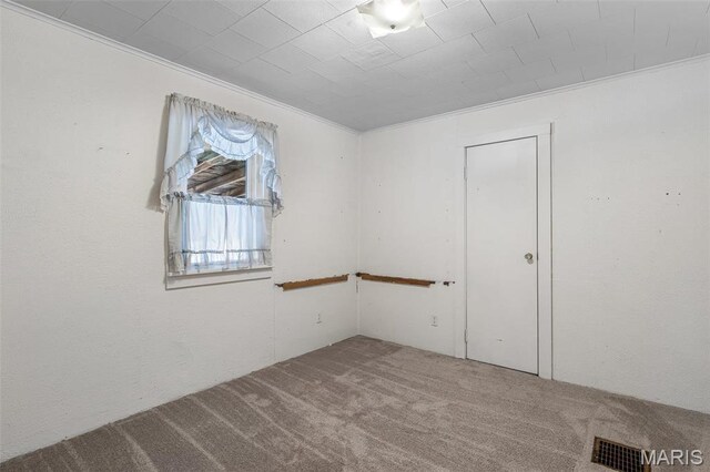 699 Clement Rd, Bloomsdale, MO 63627 - empty room featuring carpet floors and ornamental molding