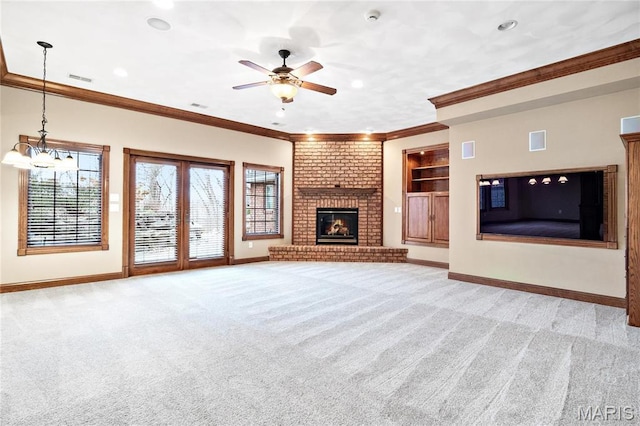 unfurnished living room featuring healthy amount of natural light, baseboards, carpet flooring, ornamental molding, and recessed lighting
